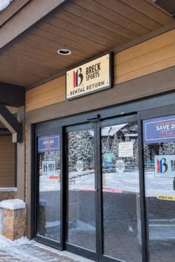 Snowy Breck Sports storefront with a &ldquo;Rental Return&rdquo; sign over the entrance doors.