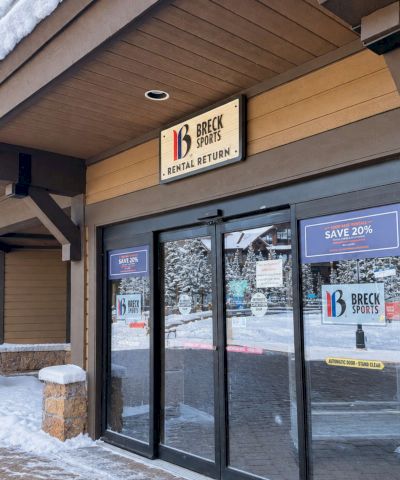Snowy Breck Sports storefront with a &ldquo;Rental Return&rdquo; sign over the entrance doors.